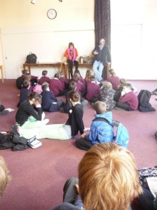 Dick Strawbridge and Julia Hailes discussing green living with 'Eco Schools' participants